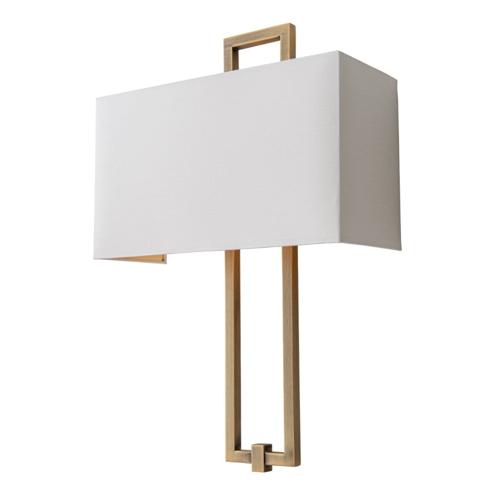 brass wall light with off white shade