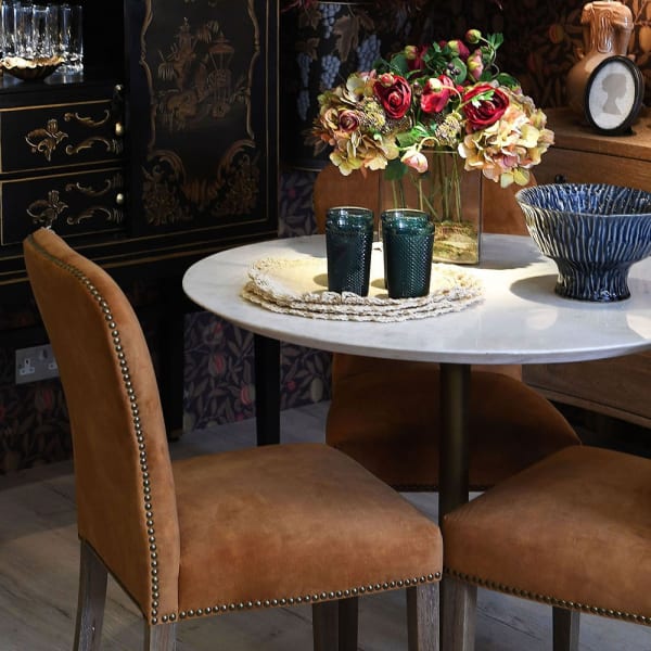 Gold Velvet dining chair with brass studding