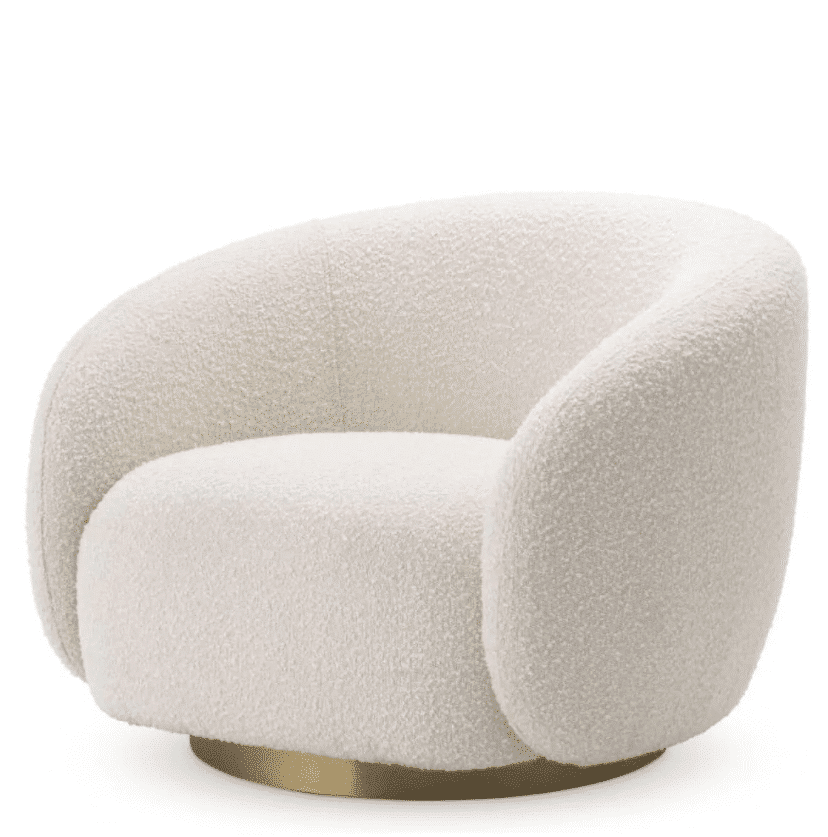 Brice Swivel Chair in bouclé cream upholstery with a brushed brass swivel base. A cosy, contemporary swivel chair.
