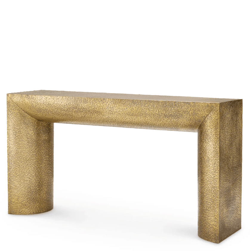 Drayton Console Table in vintage brass with a hand-hammered finish. A bold, luxurious statement piece with rich texture and warm golden tones.