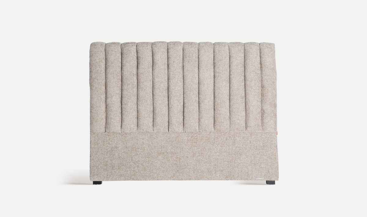 Giorgio headboard with vertical channel detailing, upholstered in grey polyester. A refined contemporary design ideal for modern bedroom interiors.