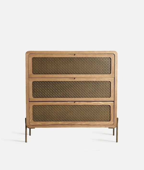 crafted from pine wood with antique gold legs and geometric aluminum detailing. Elegant bedroom storage with style.