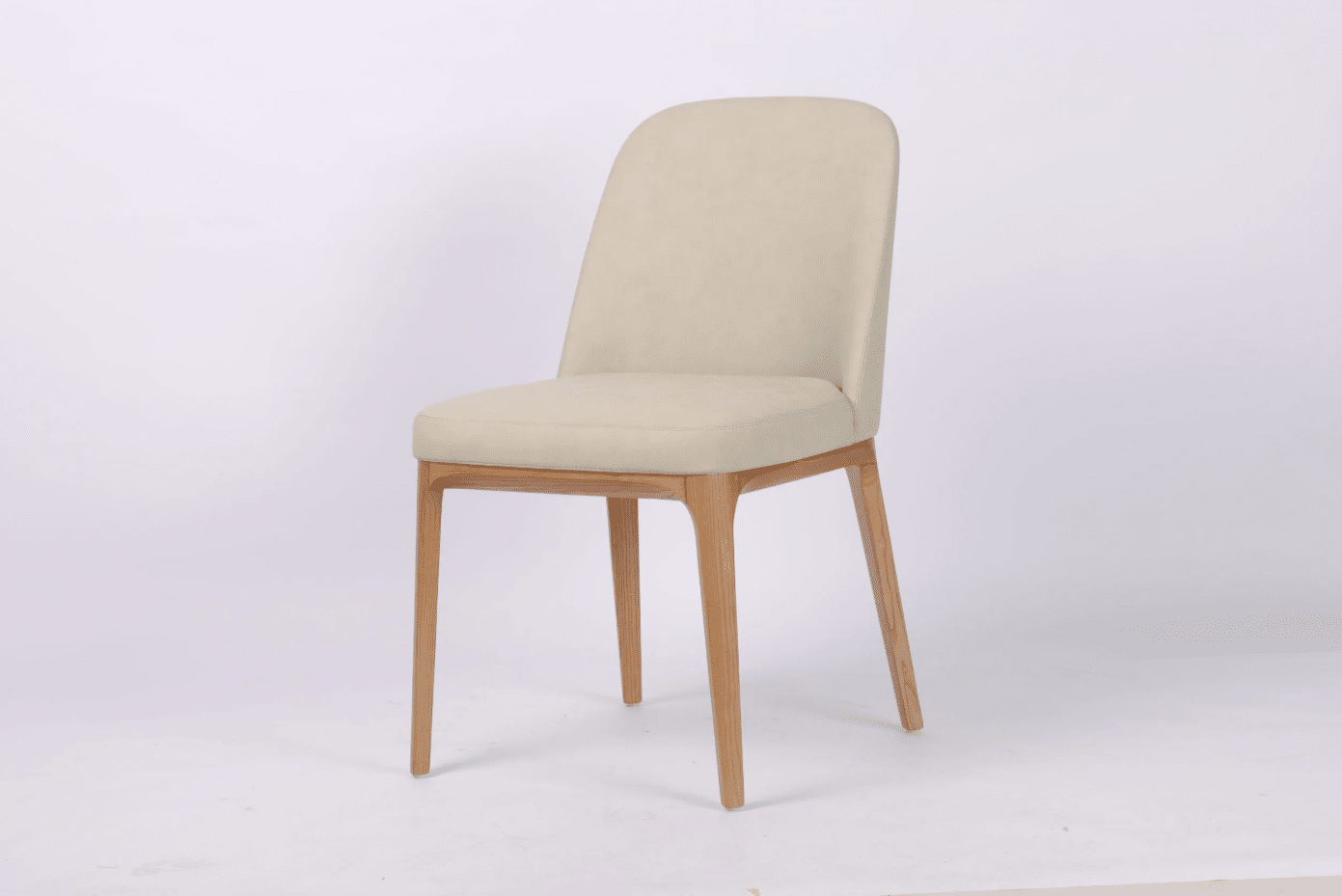 Lena Dining Chair in durable PU fabric with a simple, clean design. Padded seat and 50cm seat height, ideal for everyday dining spaces.